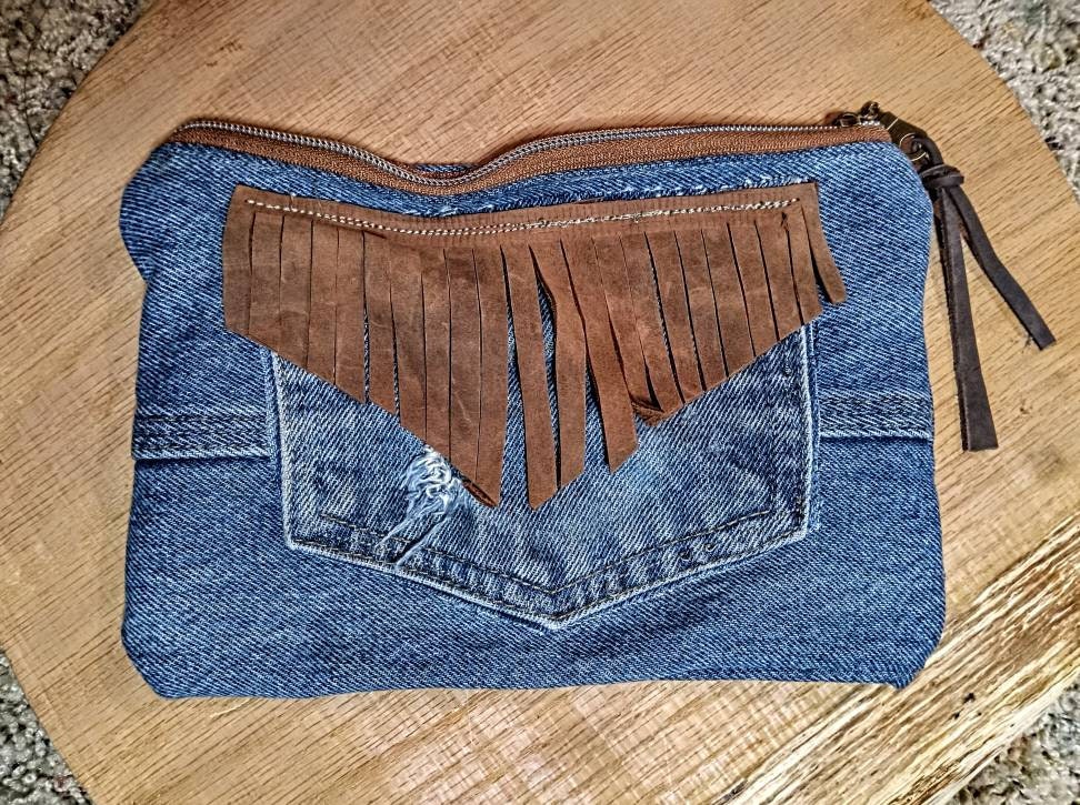 Denim and leather tassle, chew can ring zip pouch.